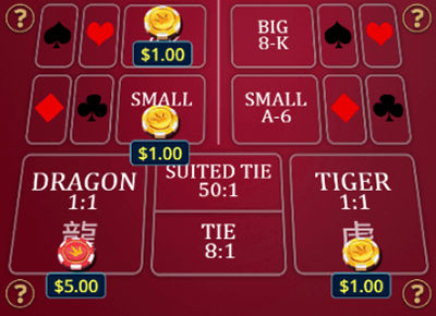 Two cards are dealt and compared Two cards are dealt and compared